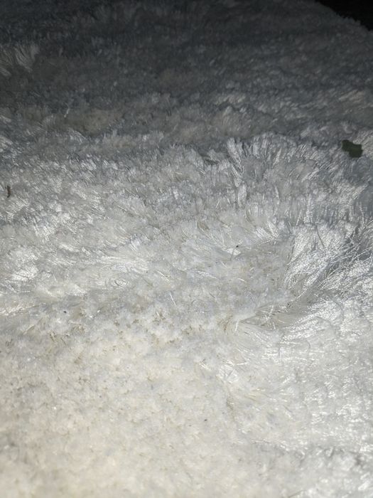 Tapete de pelo branco