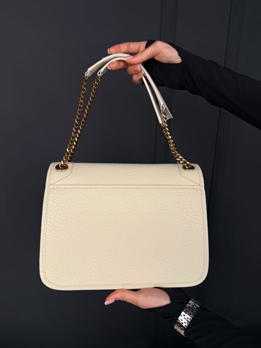 Сумка Saint Laurent Niki in Grained Lambskin Milk / Gold
