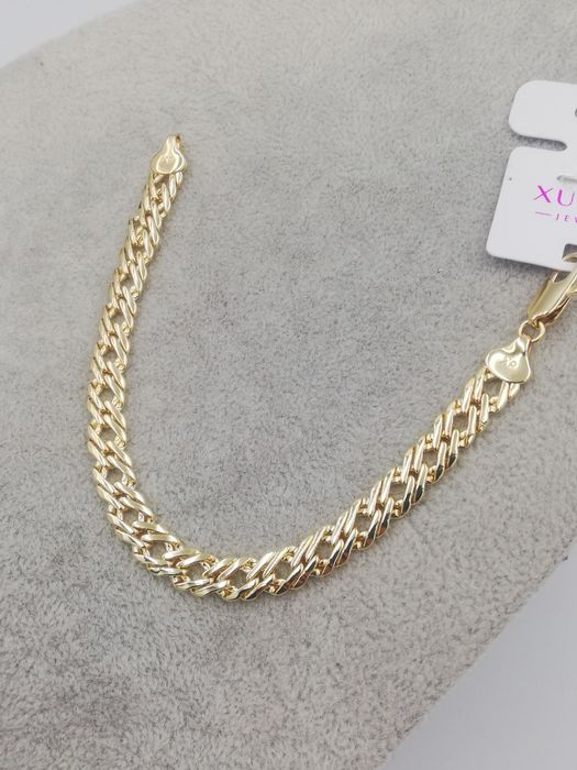 Szersza bransoletka pozłacana 14 k