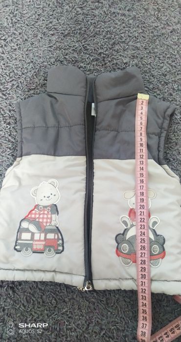 Продам детскую утепленную жилетку