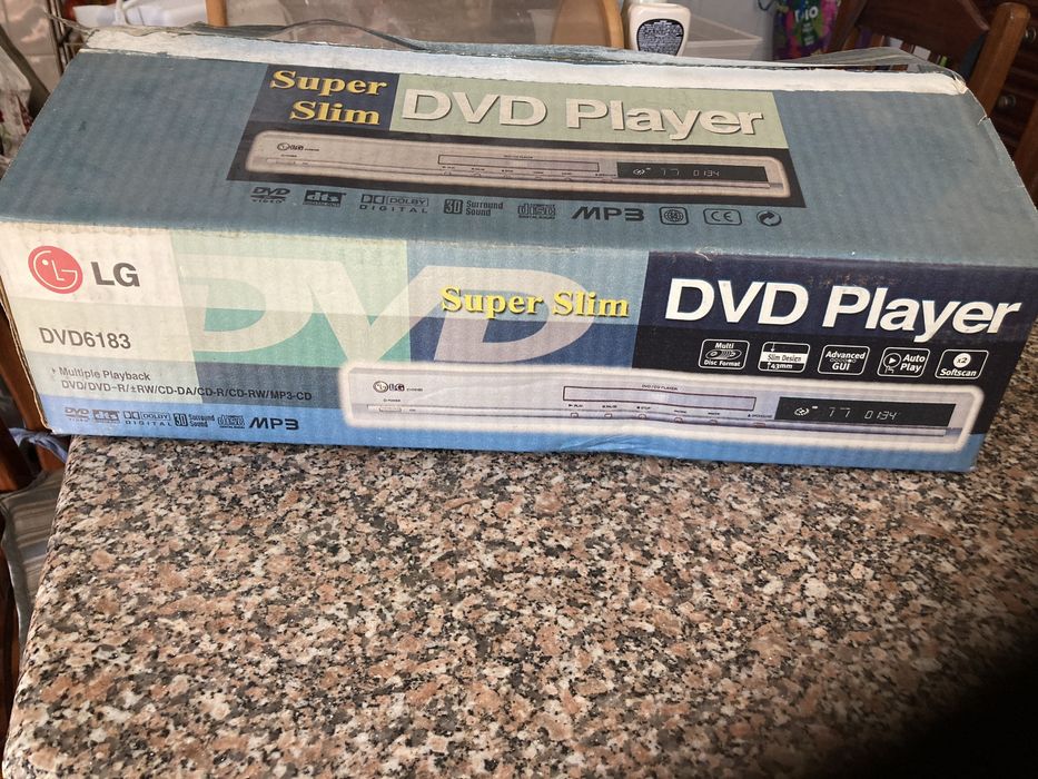 DVD marca LG como novo dentro da caixa