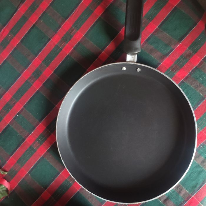 Panela inox, grelha e frigideira