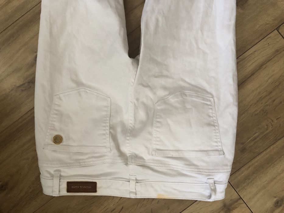 Białe spodnie jeansowe damskie Michael Kors 8/29