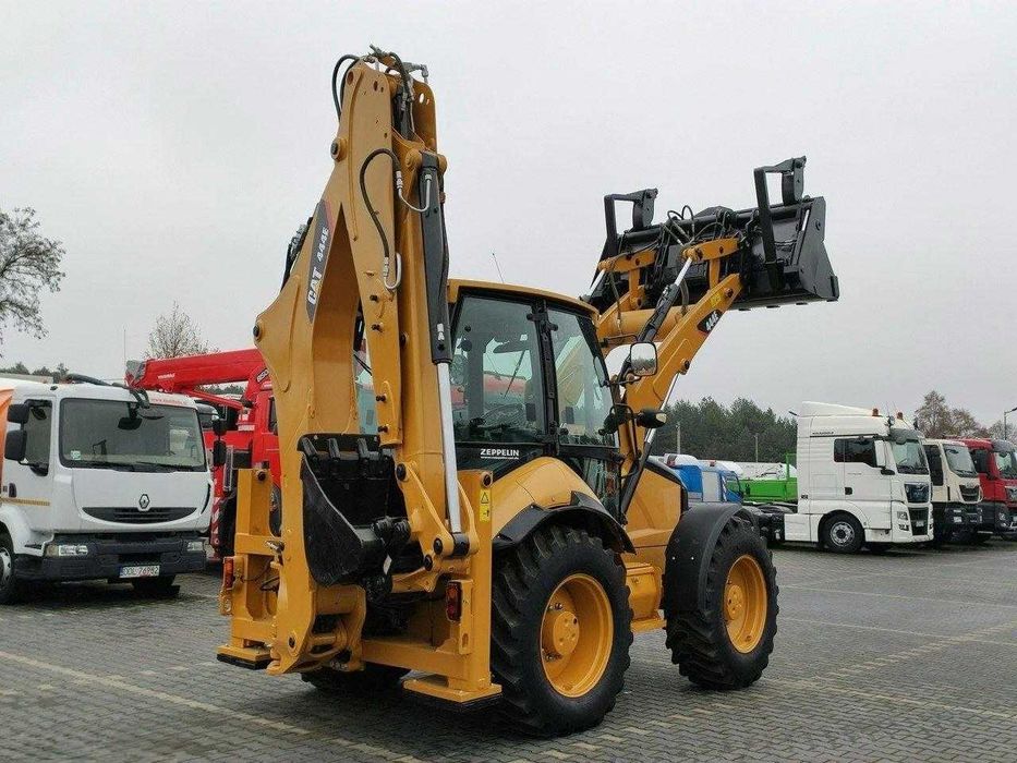 Екскаватор-навантажувач Caterpillar 444E