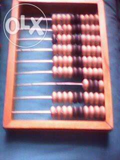 счеты старые на деревянных косточках разных размеров