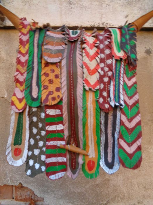 Artystyczna torebka skórzana z piórami. Handmade