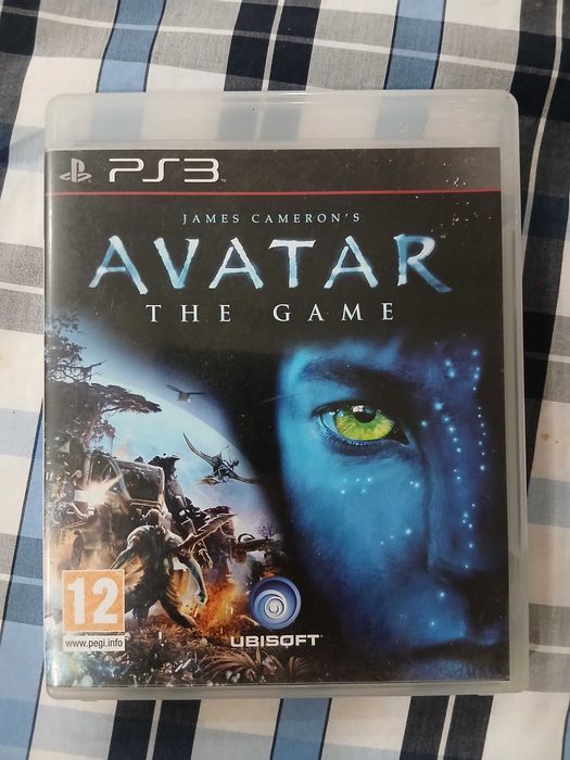 Playstation 3 usada com alguns bons jogos.