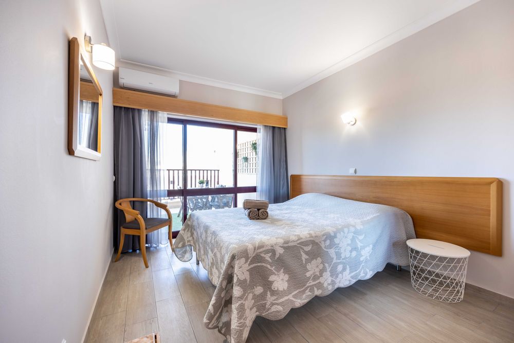 A 250 metros da praia - Magnífico T1 férias Praia da Rocha - AC, Piscina, Terraço, TV Cabo, WIFI e Garagem
