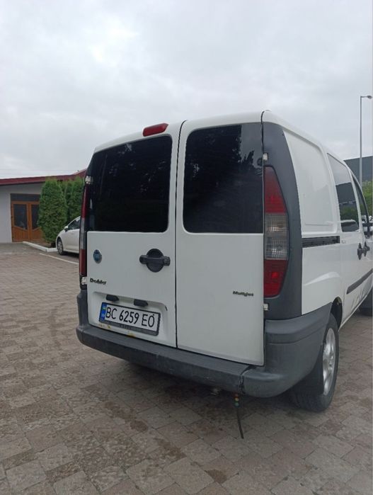 Машина Fiat Doblo