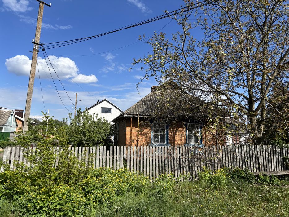 Будинок та 26 соток землі