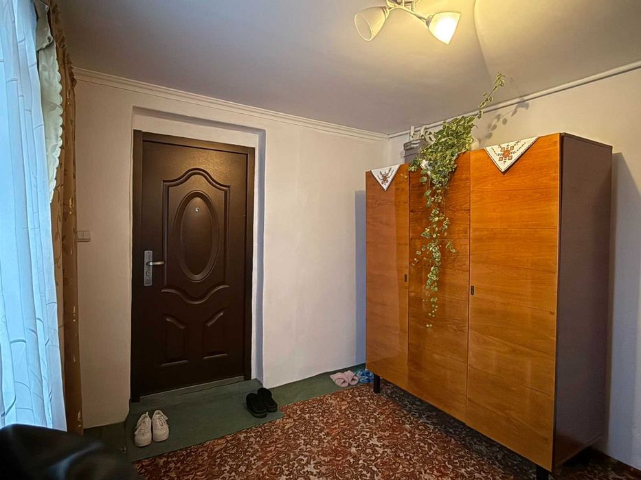 Половина будинку та земельна ділянка 16 сот., с. Батятичі