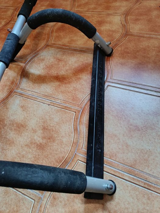 Barra de elevação para porta