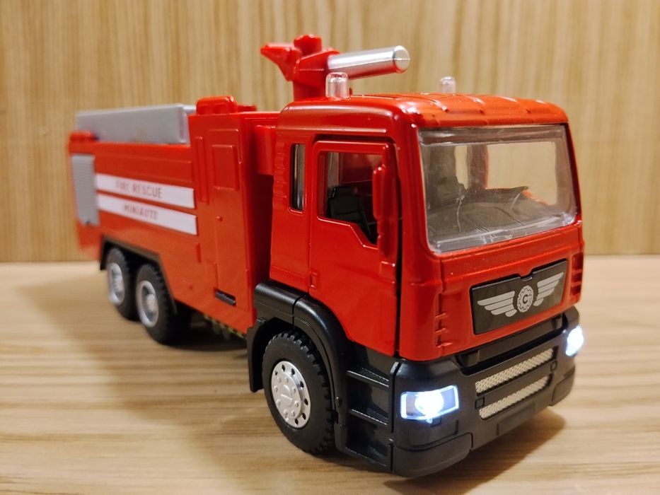 Модель Камаз пожарный  автоэвакуатор Автопром металл свет звук инерция