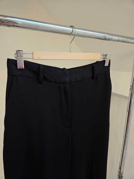 Czarne proste szerokie spodnie w kantkę eleganckie
