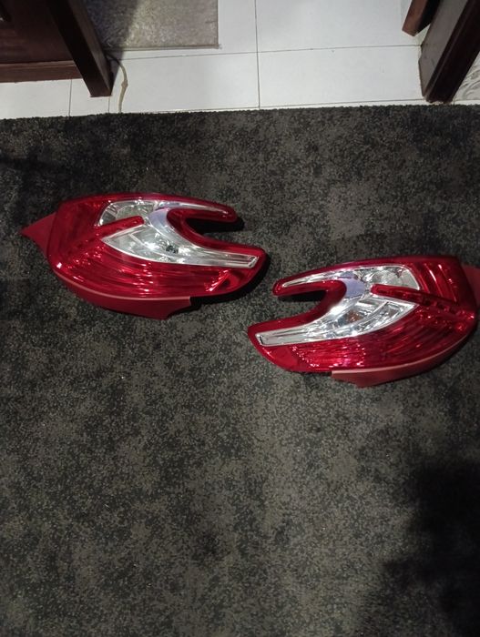 Conjunto faróis origem Peugeot 208