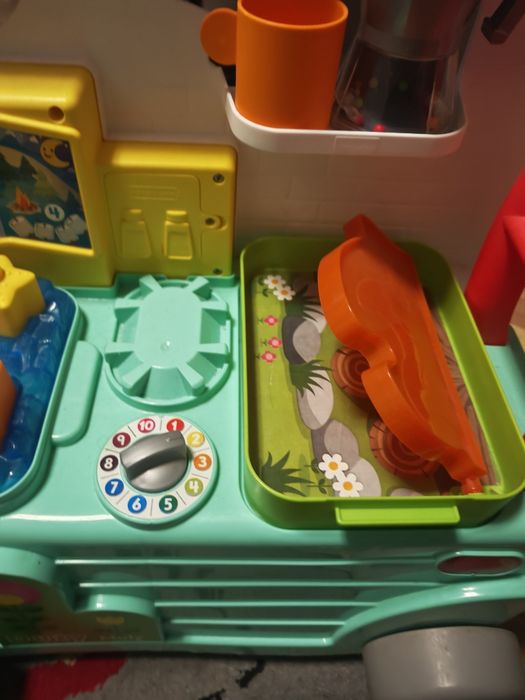 Fisher Price Wesoły Kamper Malucha pchacz jeździk grający