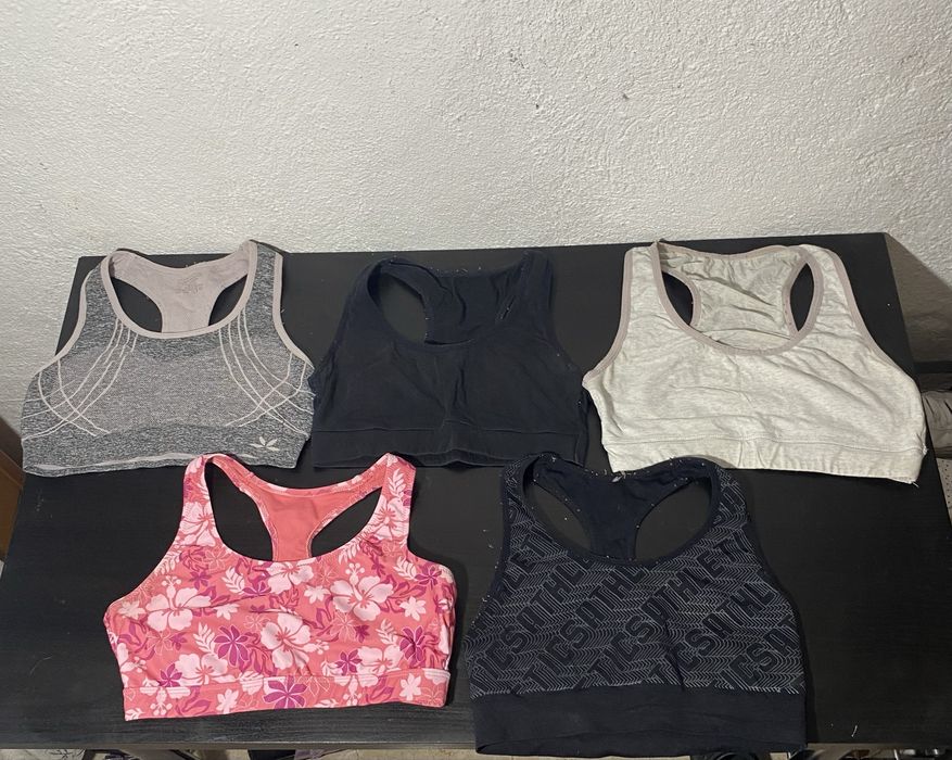 Tops de desporto fiminos