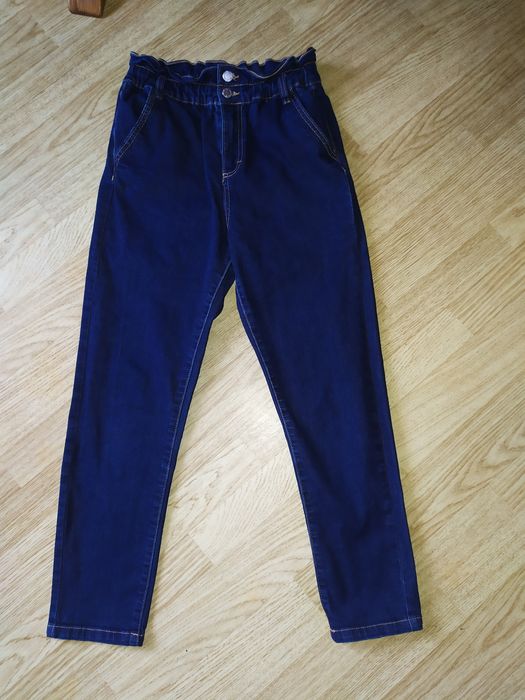 Джинси з високою посадкою