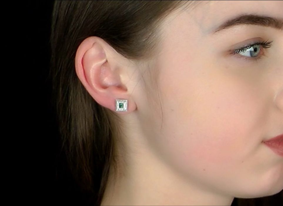 Прекрасные золотые серьги с бриллиантами и изумрудами