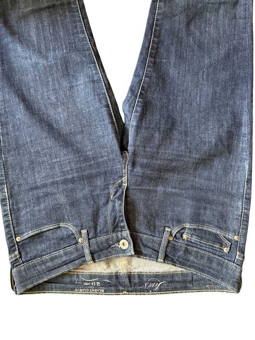 Stylowe damskie dżinsy  Levi's kultowy model Slight Curve W29 L32
