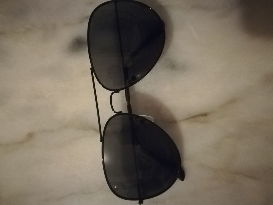 Óculos de sol pretos