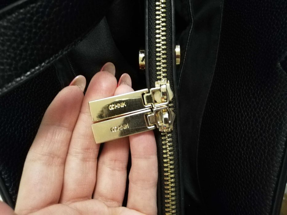 torebka skórzana Ochnik Daily liczne kieszonki zamki