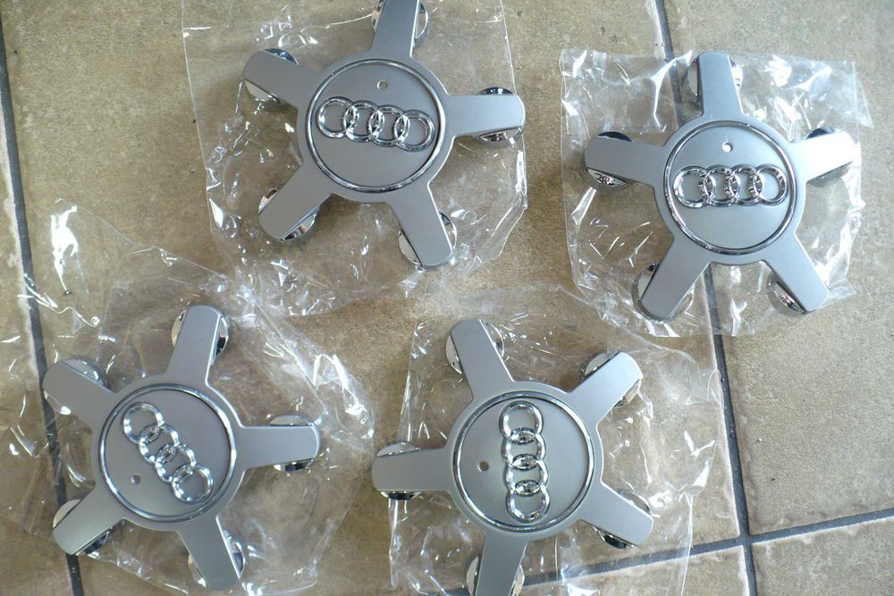 Pająki Dekielki Audi Oryginalne NOWE Komplet