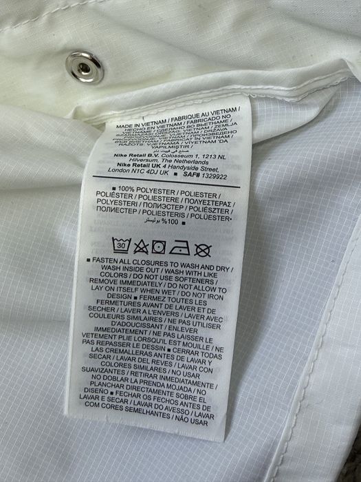 Жіноча нова куртка вітровка Nike