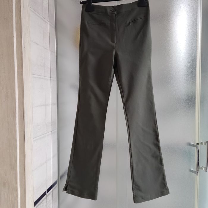 Spodnie khaki-damskie, szerokie dołem,rozm 36/38