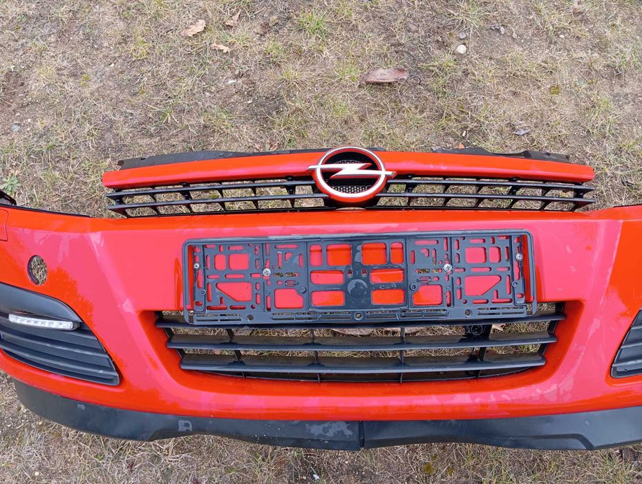 OPEL ASTRA H III Zderzak przód kompletny Grill Oryginał Y547