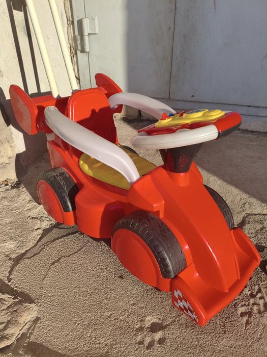 Дитяча машинка-толокар з батьківською ручкою