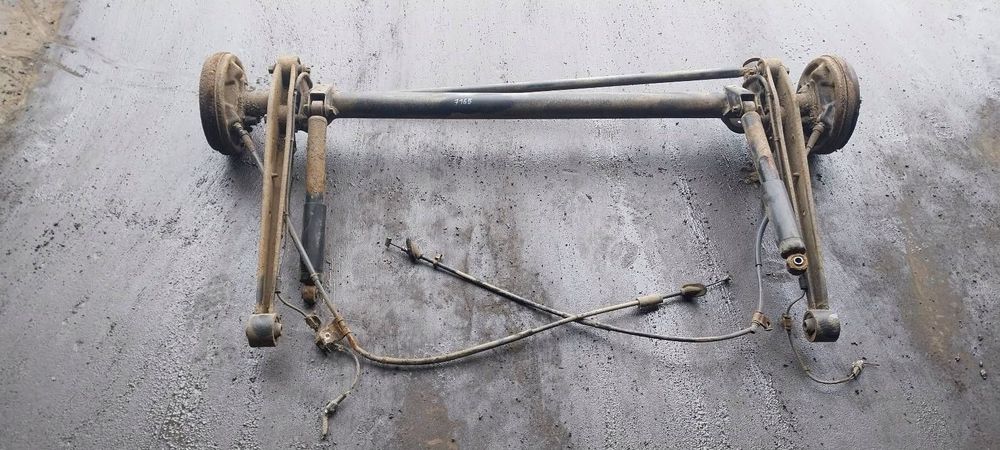 BELKA OŚ ZAWIESZENIA TYŁ BĘBNY Z ABS OPEL AGILA A