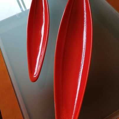 Orange decorative bowls/canoes