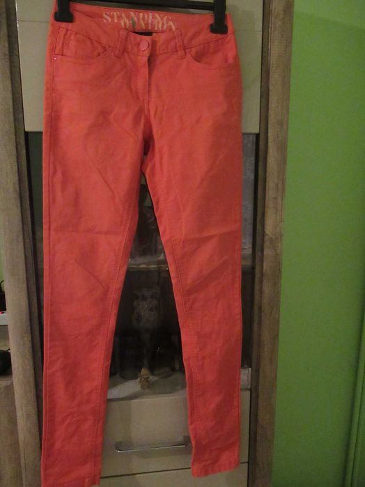 Spodnie pomarańczowe r. 34 colours