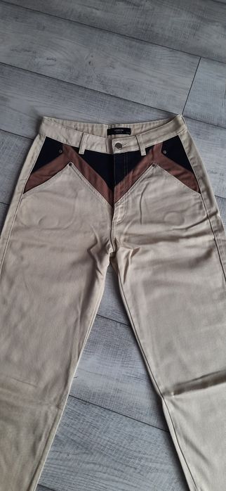 Beżowe mom jeans Reserved 40