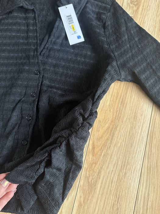 Damska bluzka DKNY czarna M 38