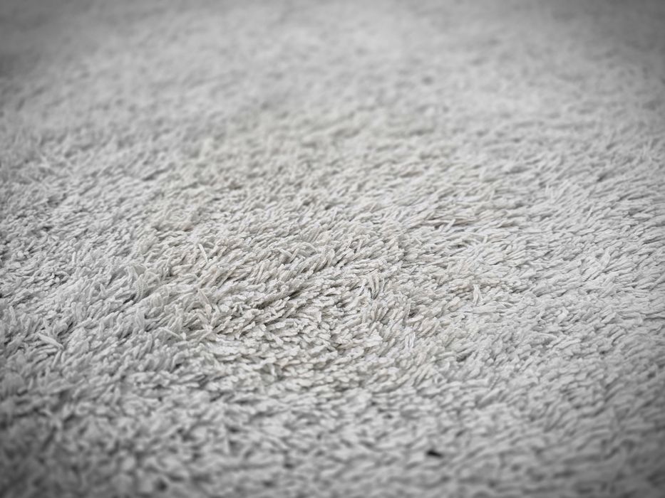 2 tapetes creme de 160x85 cms