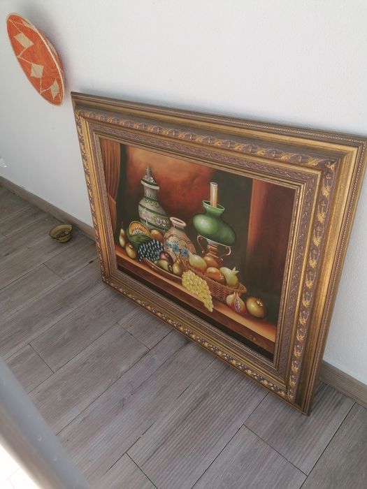 Quadro muito bonito com uma moldura dourada. 1,10 /0,90