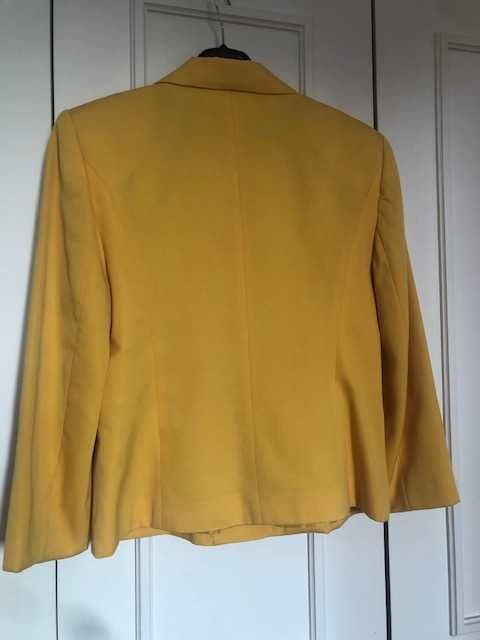 Casaco de senhora amarelo da marca de luxo Norbert Grin