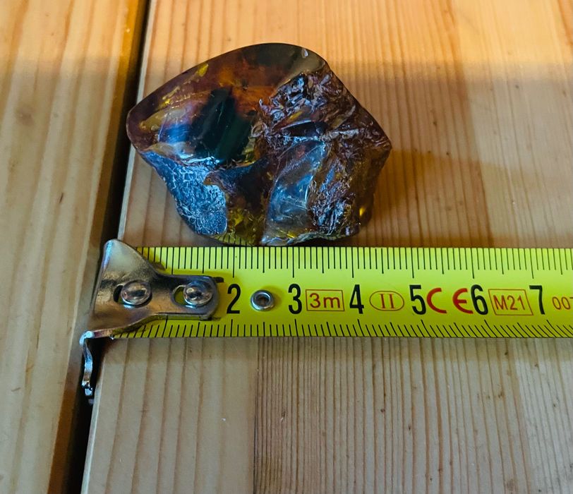 Nowa bryłka oszlifowanego bursztynu na wisior 12,32 gram