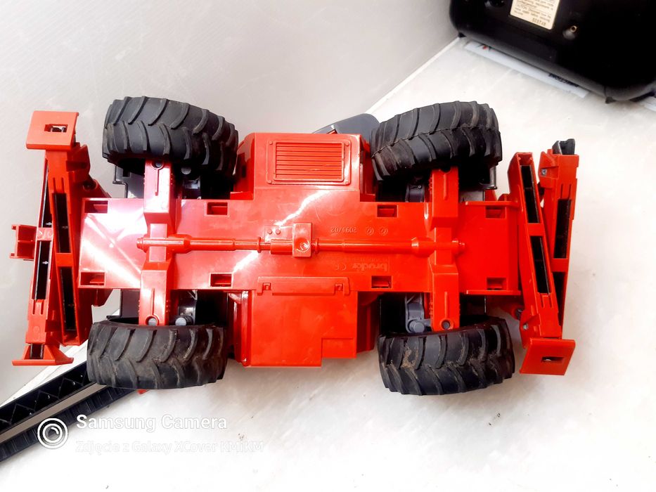 zabawka dźwig ładowarka model Bruder Manitou MRT2150 uszkodzona
