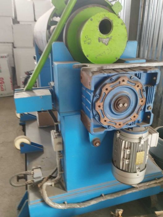 розмотувач рулонів металу