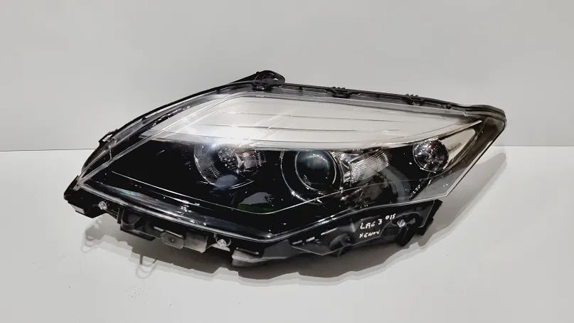 Reflektor lewy xenon Renault Laguna III lift europa