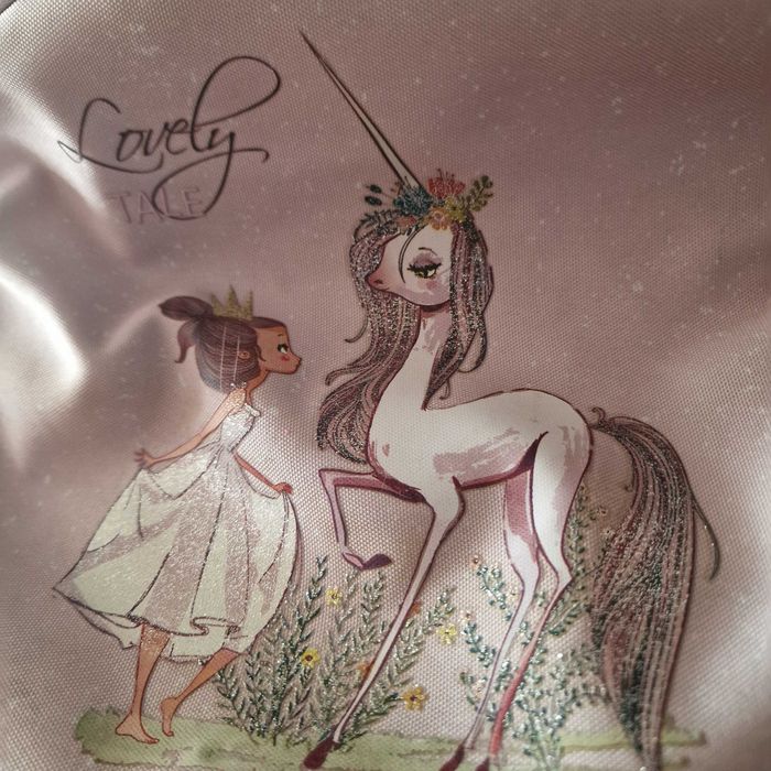 Рюкзак на колесах для дівчинки початкових класів