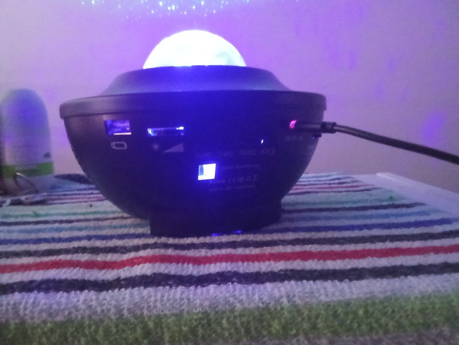 Coluna com projetor de luz