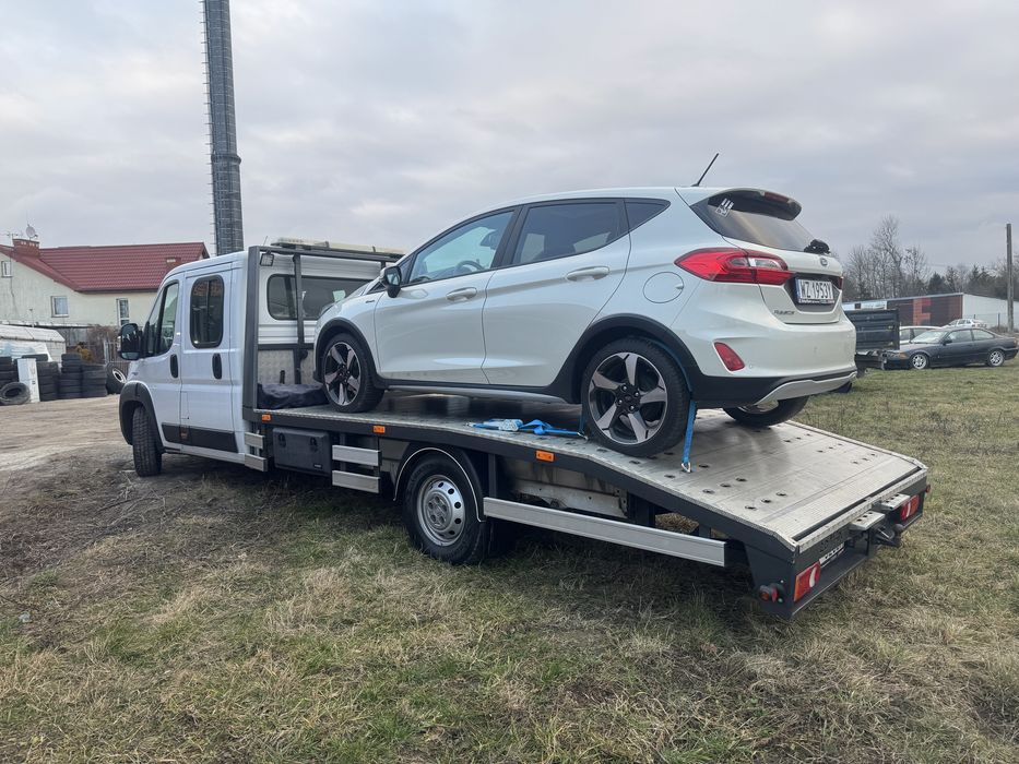 Uslugi transportu lawetą,doka 5 osobowa ,holowanie, pomoc drogowa 24/h