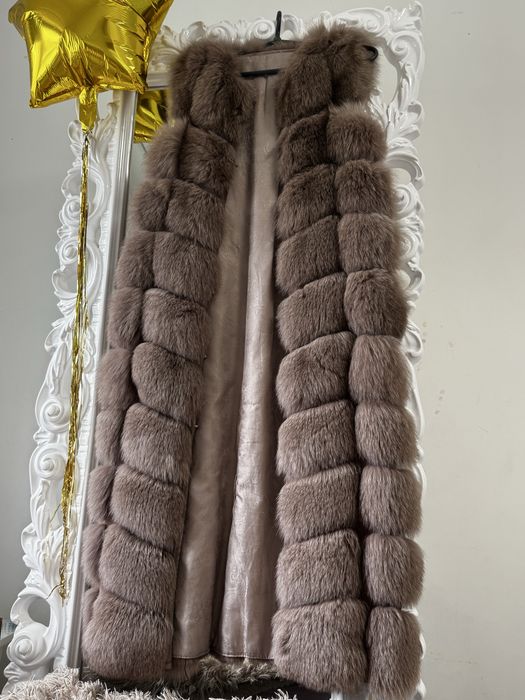 Продам меховую жилетку с натурального  меха