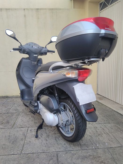 Honda PS 125i impecável.