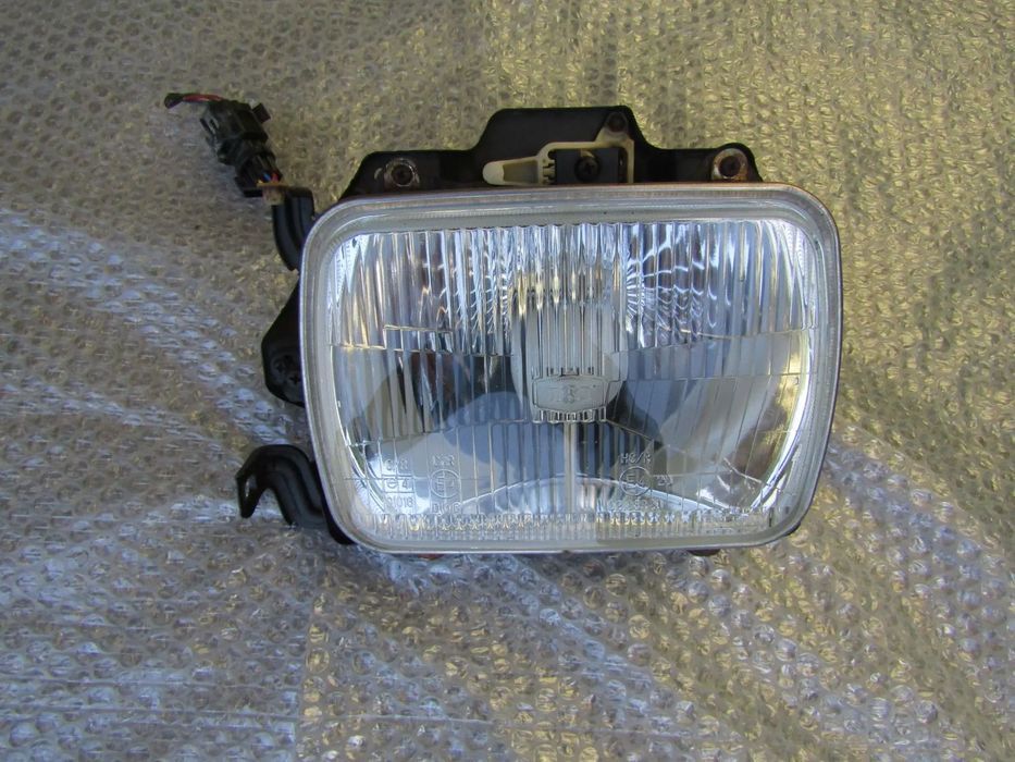 Farol (otica ) Opel Campo , original (ver descrição)
