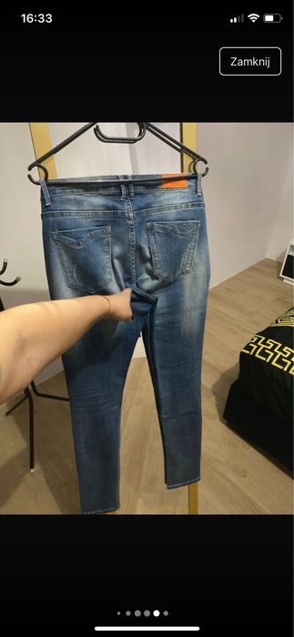 Spodnie jeansowe gumowane z dziurami rozmiar XL